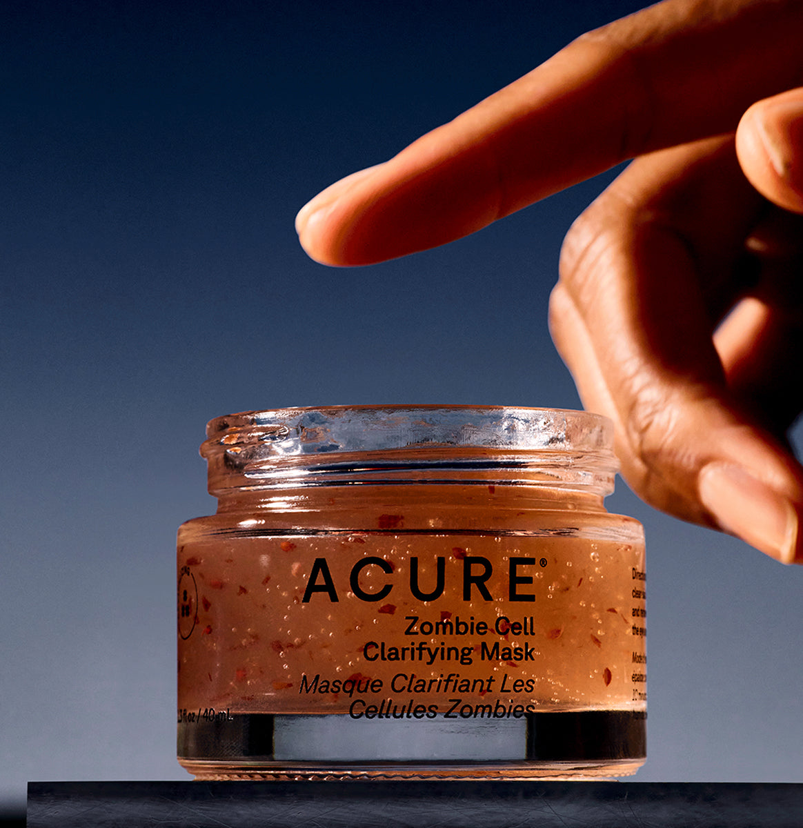 Hand scooping Acure Zombie Clarifying Mask