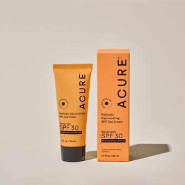 radically rejuventaing SPF Day Cream SPF 30 tube next to its packaging