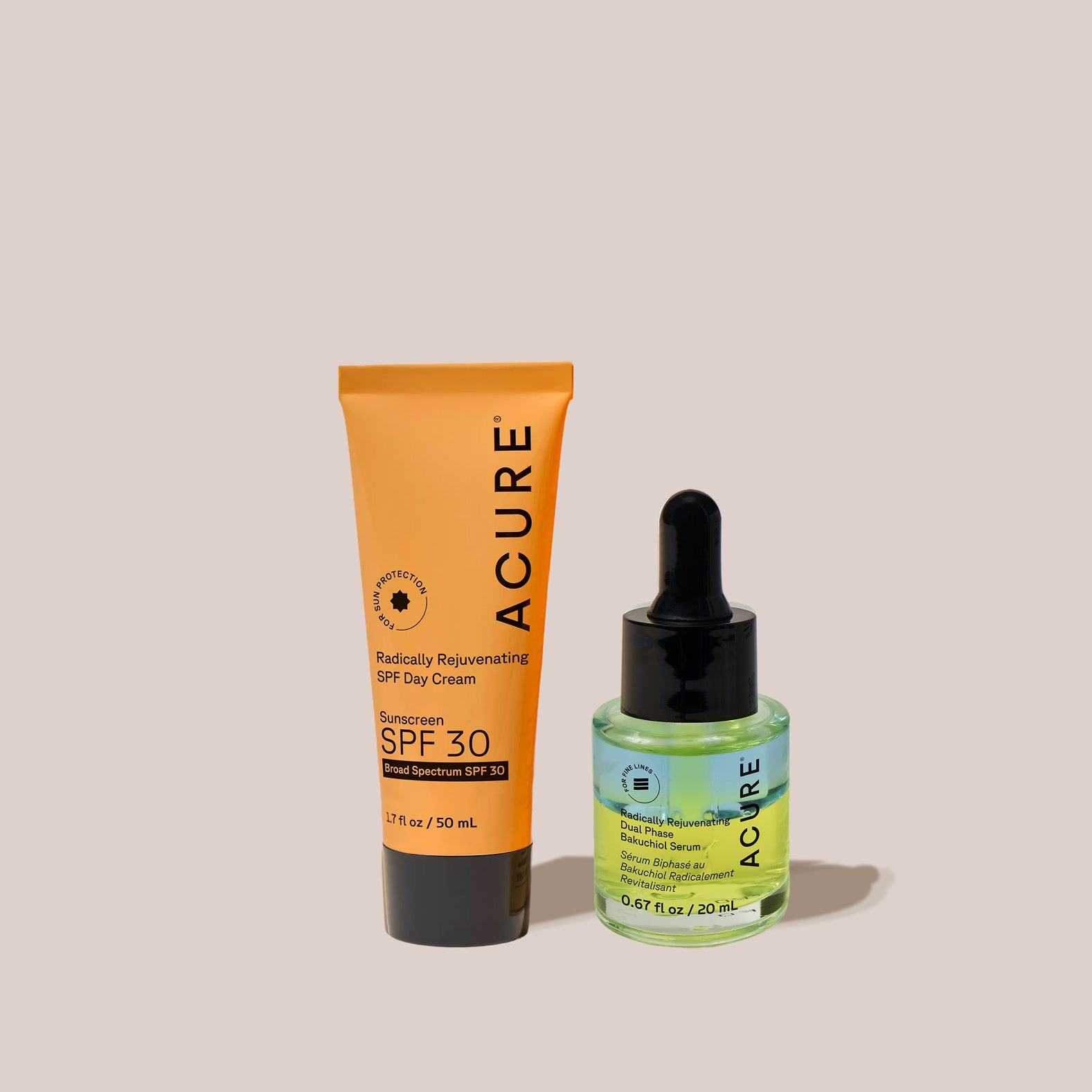 Acure sunscreen products on a beige background