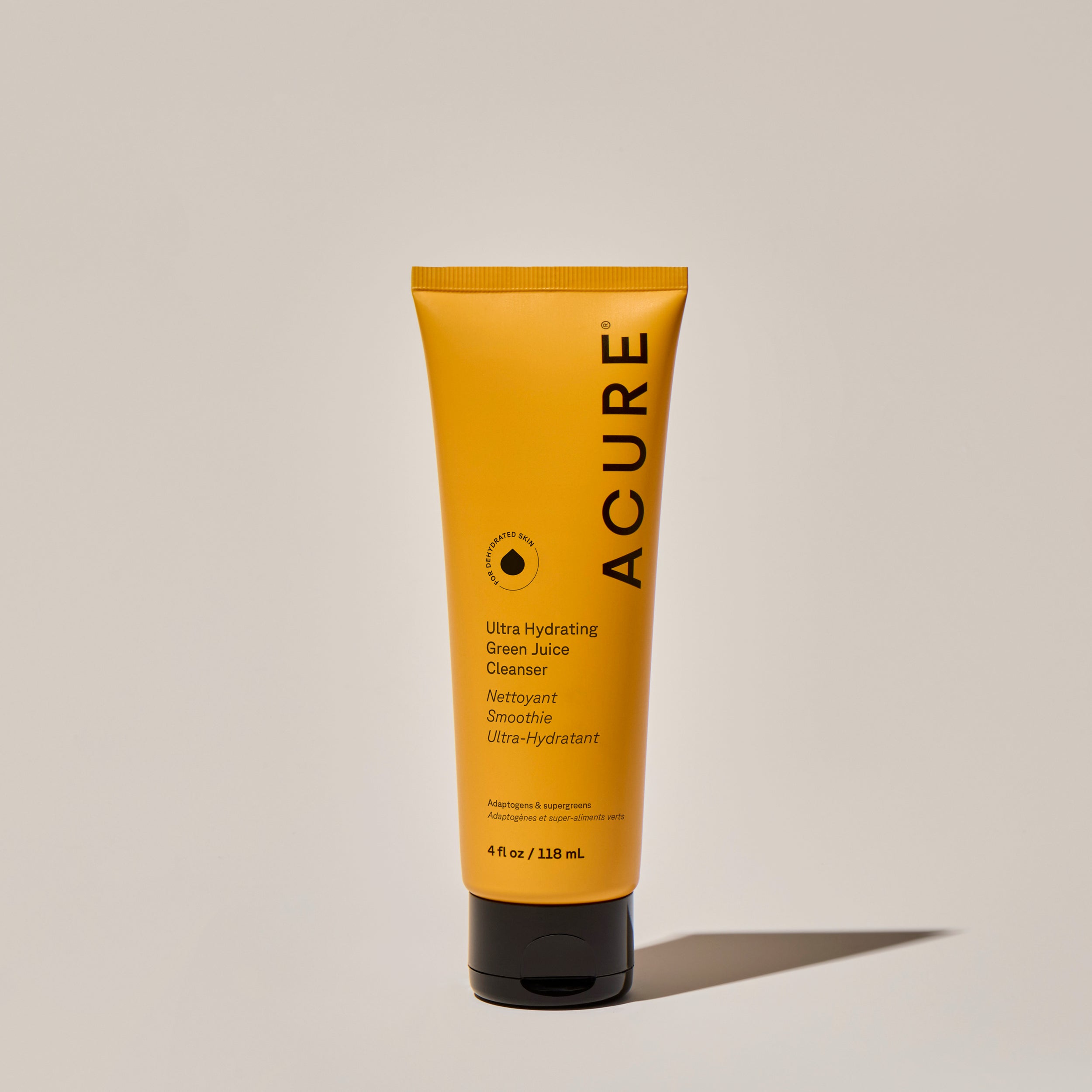 A tube of ACURE Ultra Hydrating Green Juice Cleanser against a neutral background.