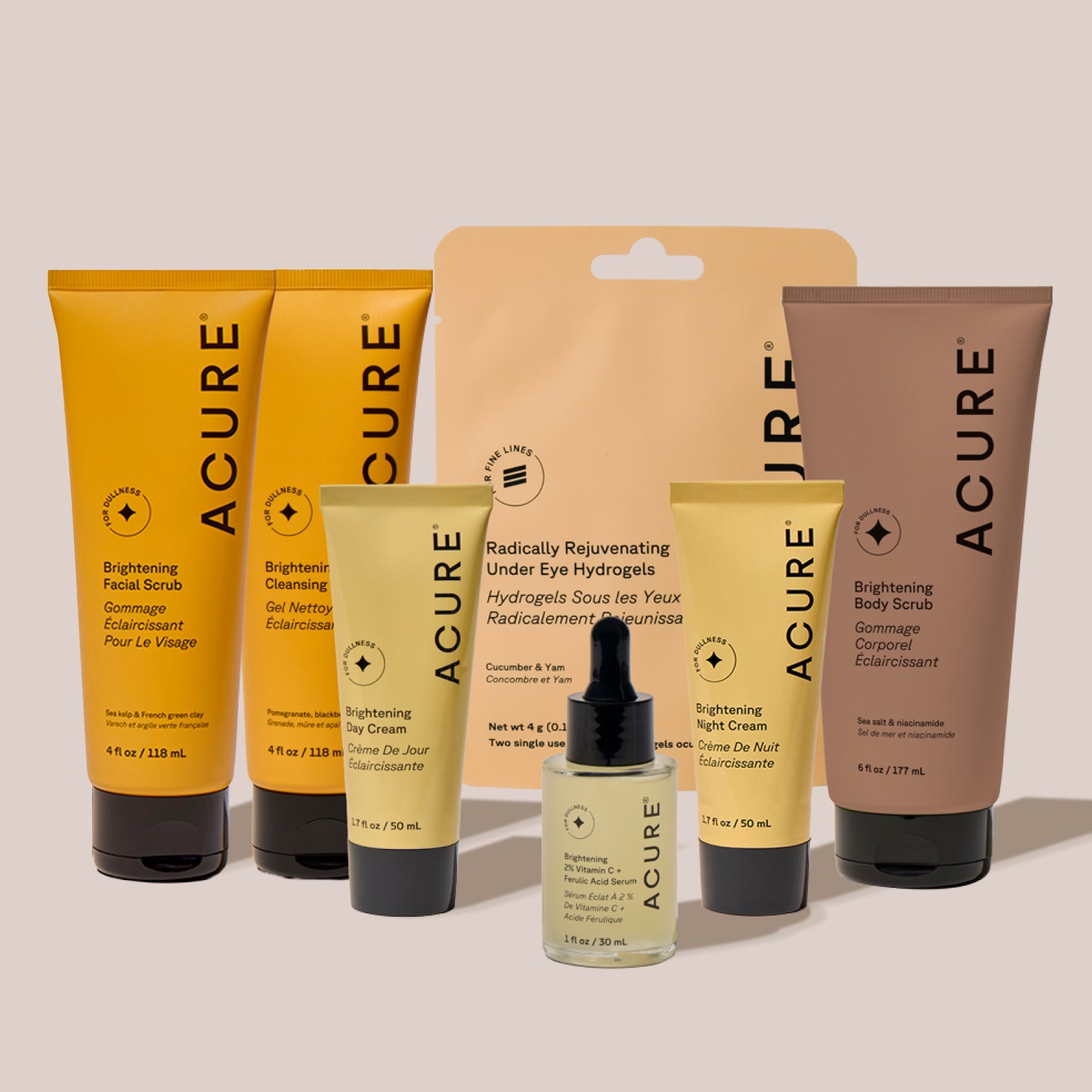 Acure Ultimate brightening kit for radiant, hydrated and bright skin including Brightening facial scrub Brightenting cleansing gel, BRightening day cream, Radically rejuvenating under eye hydrogels, brightening 2% Vitamin C+ Ferulic acid serum, Brightening Night cream and Brightening body scrub