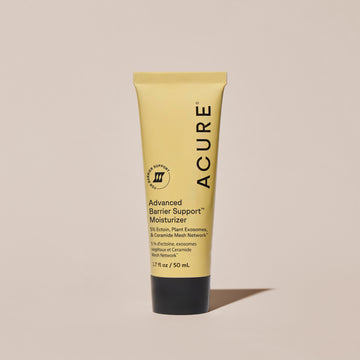 Acure Advanced Barrier Support Moisturizer tube on a beige background