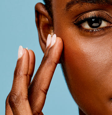 Woman with Rejuvenated skin after applying Acure's eye cream