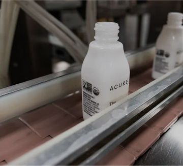 Acure bottle in production line