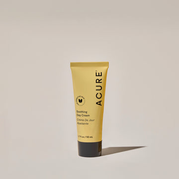 A tube of ACURE Soothing Day Cream against a neutral background.
