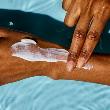 Sunscreen application on the arm and hand