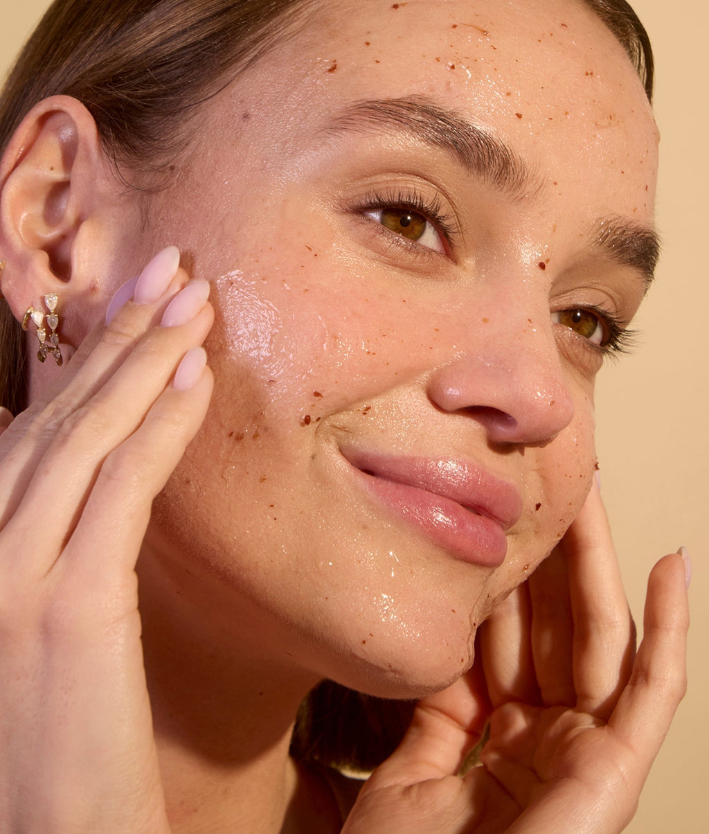Woman applying Zombie Clarifying mask on her face for a rejuvenated look