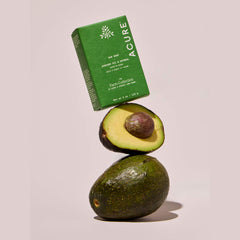 Avocado and Acure organics box on a light pink background