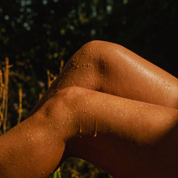 Close-up of wet skin with a natural background