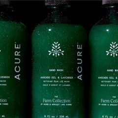 Three bottles of Acure x Apricot Lane Farm hand wash with visible branding.