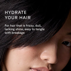 Close-up of a person with dark hair, with text about hydrating hair.