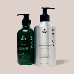 Two Acure Organics bottles, one green and one silver, on a light beige background.