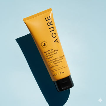 Acure skincare tube on a light blue background