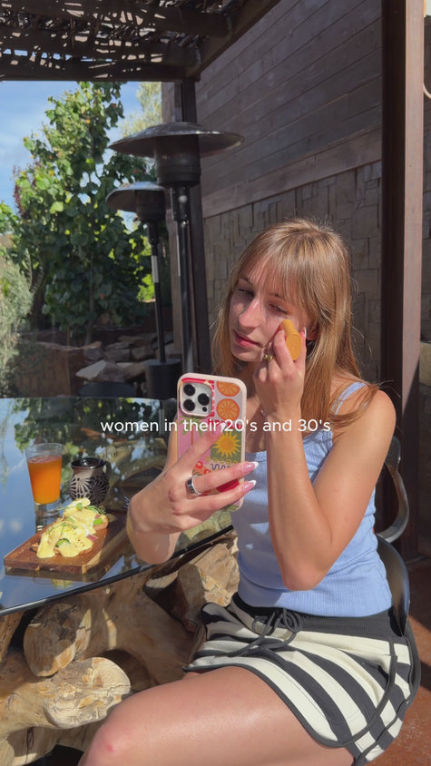 ugc video of a young woman using acure invisible sunstick