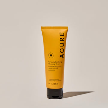 A tube of ACURE Seriously Soothing Cleansing Cream against a neutral background.