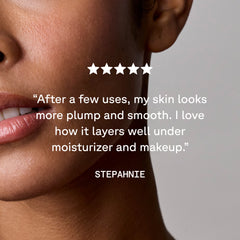 Close-up of a person's face with a user review and 5 stars